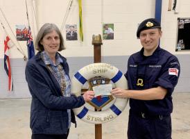 President Jackie handing over the cheque to T S Sterling